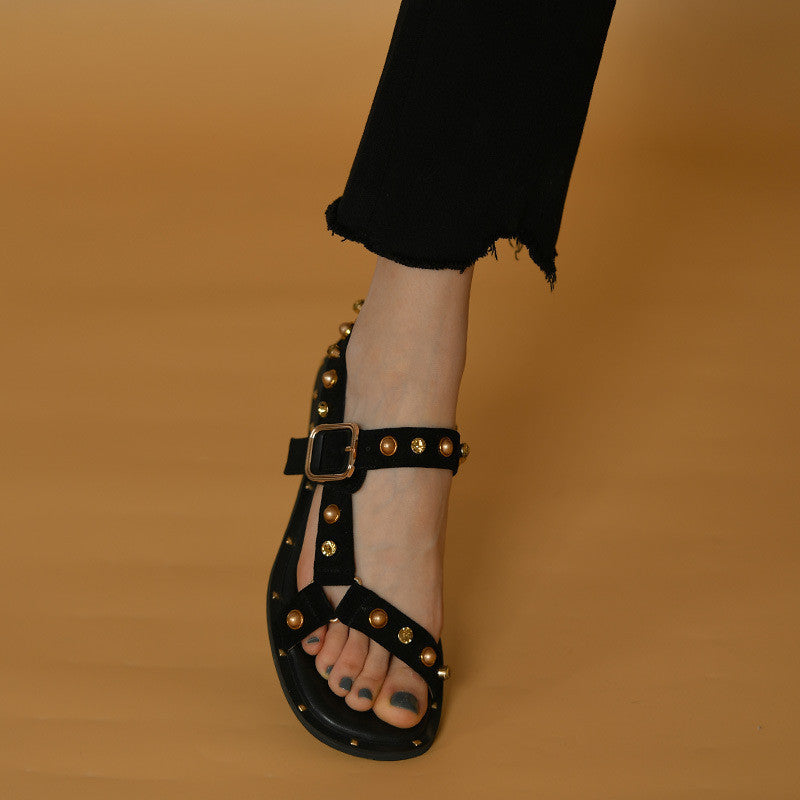 Sandalias planas negras y naranjas estilo romano para mujer