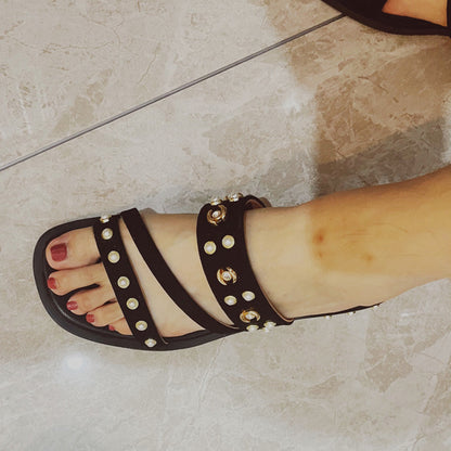 Sandalias planas negras y naranjas estilo romano para mujer